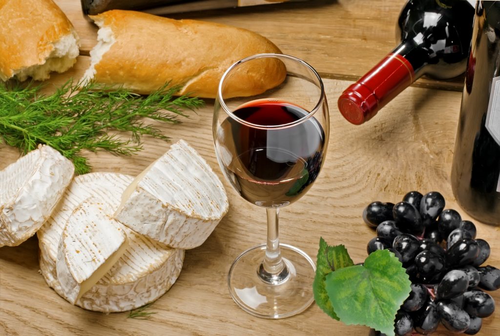 wine, cheese, and grapes